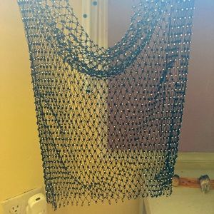 Netted black cropped sleeveless top with rhinestones throughout entire top